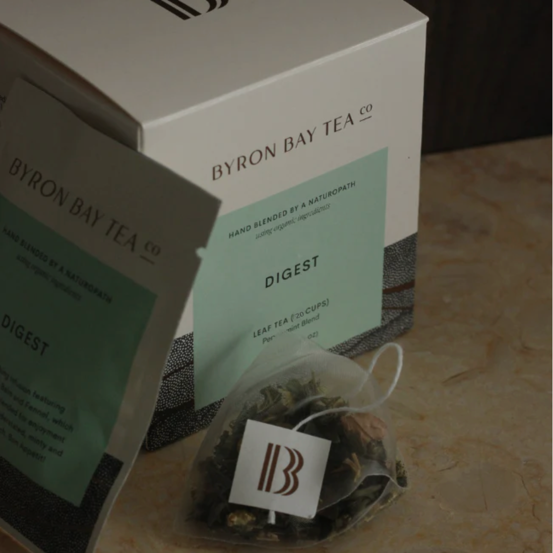 Byron Bay Tea Co. tea packaging and bag on a wooden surface