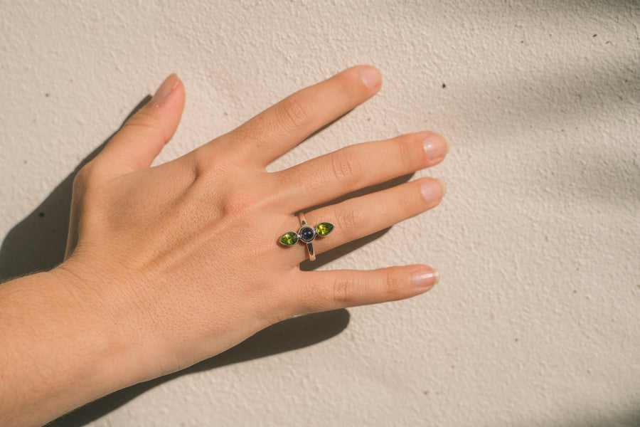 FACETED PERIDOT AND IOLITE TRILOGY RING