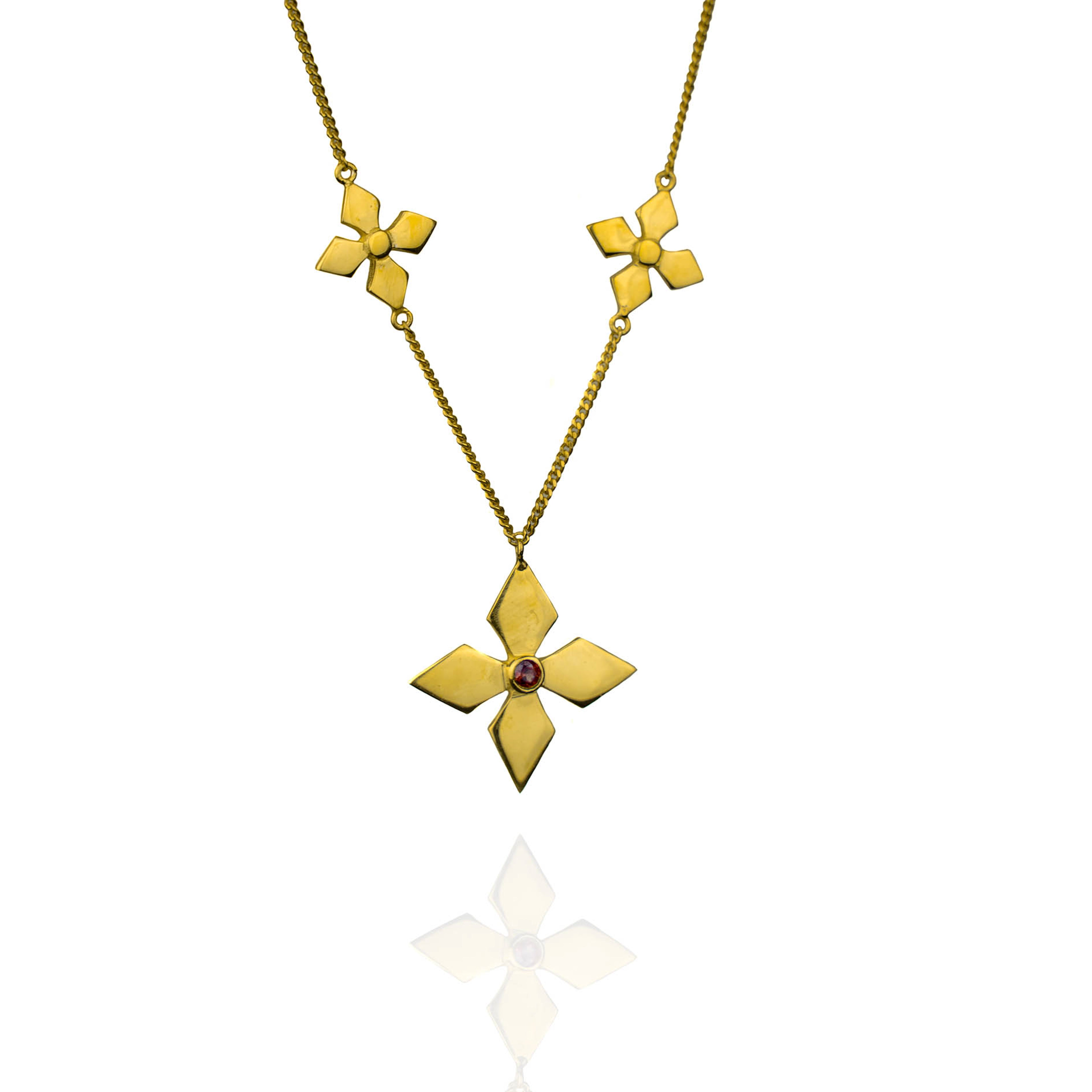 Gold triple blossom necklace with garnet