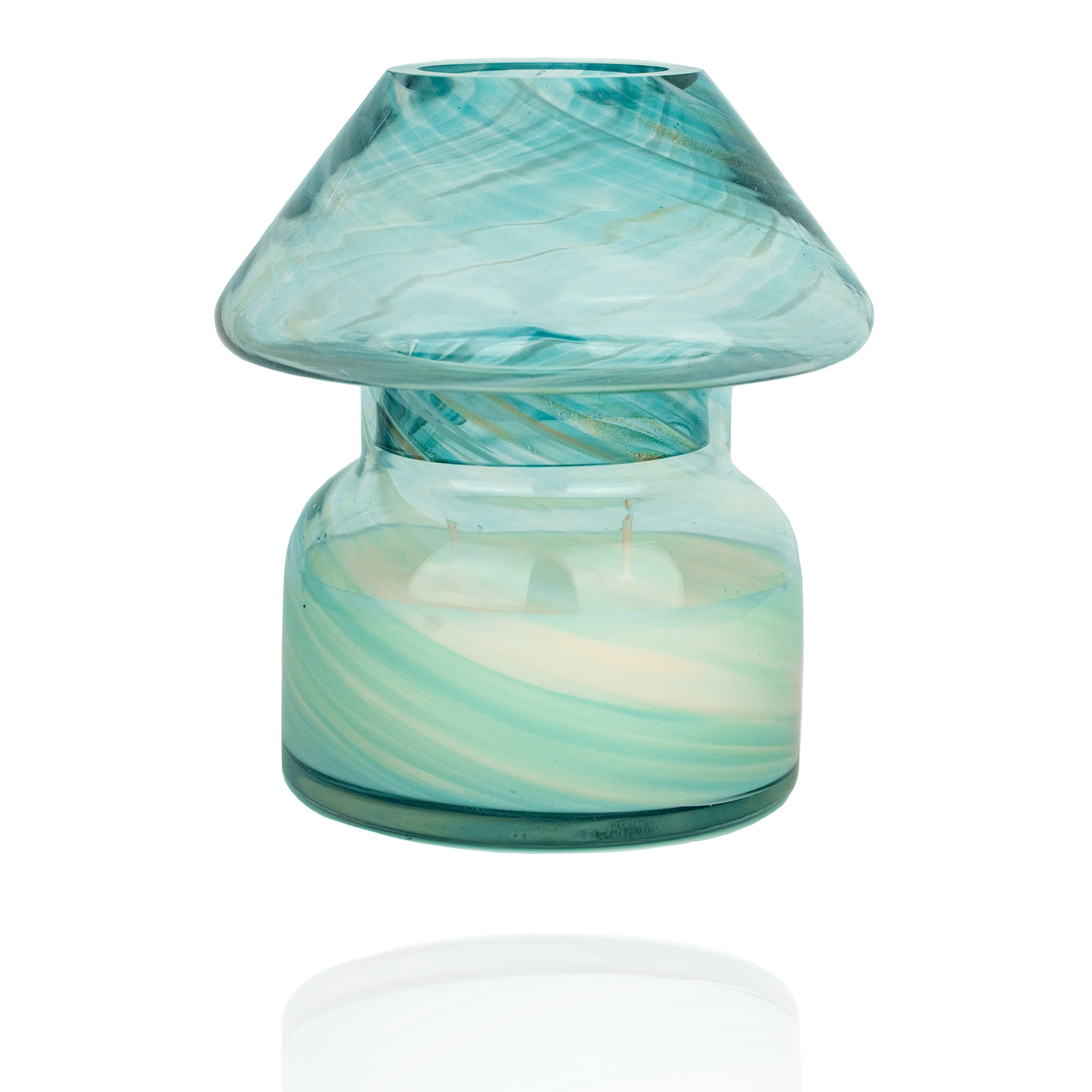 Mushroom candle lamp with aqua blue and gold glitter swirls on clear glass. Mushroom lamp is filled with 100% soy wax.