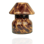 Mushroom candle lamp with light and dark brown spots on tan coloured glass. Leopard candle lamp is filled with 100% soy wax